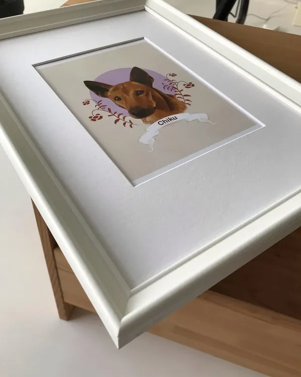 A finished digital portrait of Chiku, professionally matted and framed in white. The matting adds a lovely border that draws the eye to the artwork itself.