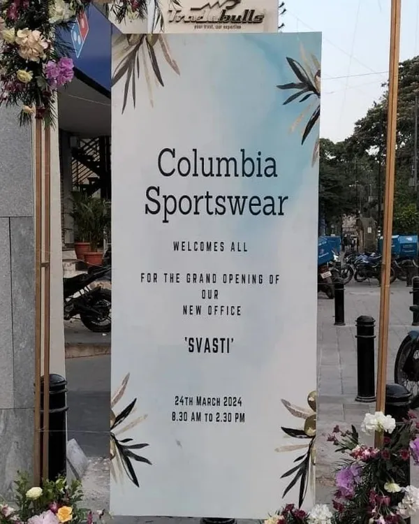 Clear and elegant signage is key for a grand opening. For Columbia Sportswear's new office, we designed and placed this welcome sign, framed with subtle floral accents, to professionally greet and direct guests upon arrival.