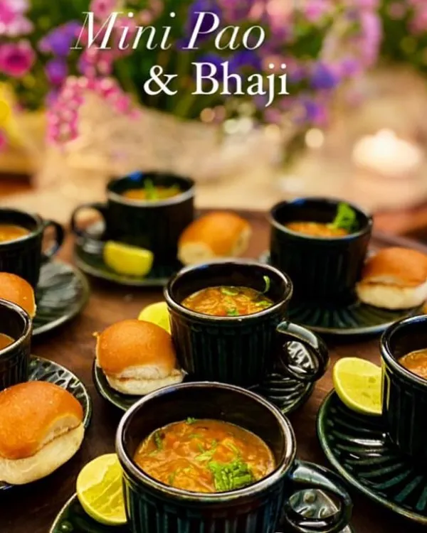 I bring you delicacies from around the world, and sometimes, from our own streets with a twist. This is my Mini Pao & Bhaji, served elegantly in small cups and saucers. It's a bite-sized version of the Mumbai classic, perfect for sophisticated snacking.