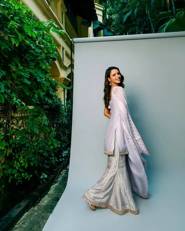 Behind the scenes with the gorgeous Tripti Dimri. I styled her in this lovely lilac and white printed sharara set from House of Masaba. It's a perfect example of a fresh, modern, and comfortable ethnic look.