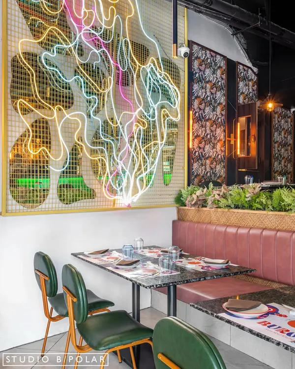 This custom neon art installation at Burosu restaurant is the heart of the space, creating an electric atmosphere that mirrors the bold flavors of pan-Asian street food. We designed it to be an immersive centerpiece that draws guests in and sets a dynamic, modern tone for the dining experience.