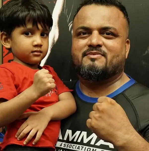 It starts from the youngest age. Here I am with one of our smallest warriors. At FCC, every child is part of the family from day one.