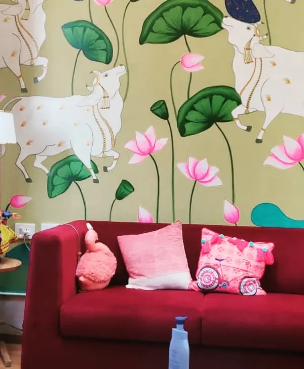 Seeing my art become part of a home is the best feeling. Here is a traditional Pichwai wall mural I painted for a residential project, bringing that 'Shivbharat' vibe to the living space. The cows and lotuses create such a peaceful atmosphere.