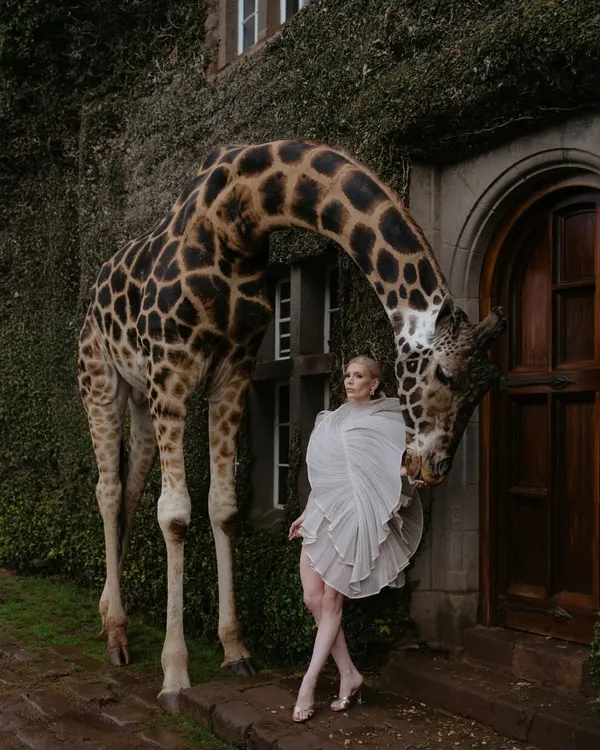 A truly magical moment at Giraffe Manor in Kenya. It's not every day that a giraffe becomes part of a bridal portrait, but for Monica, it created an image that is as unique and unforgettable as her wedding day.
