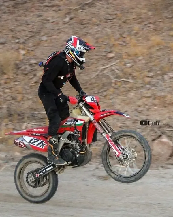 This is the essence of desert racing. A shot of our rider pushing the limits on the rugged terrain of the Baja course. It's about skill, endurance, and a machine built to conquer anything.