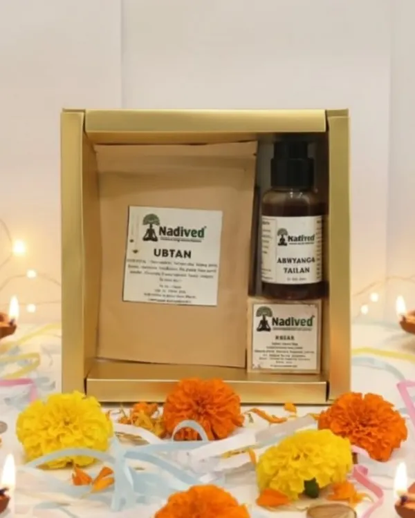 A closer look at the Abhyanga Snan Rituals gift box, surrounded by marigolds and diyas. This set is designed to bring the traditional practice of self-care into your home.
