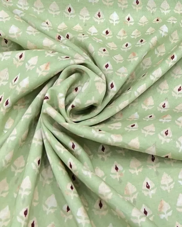 As soft as a cloud, as pretty as a print can be. This printed mul mul cotton in a lovely pastel green is made for sunlit days and comfortable, stylish kurtas or dresses.