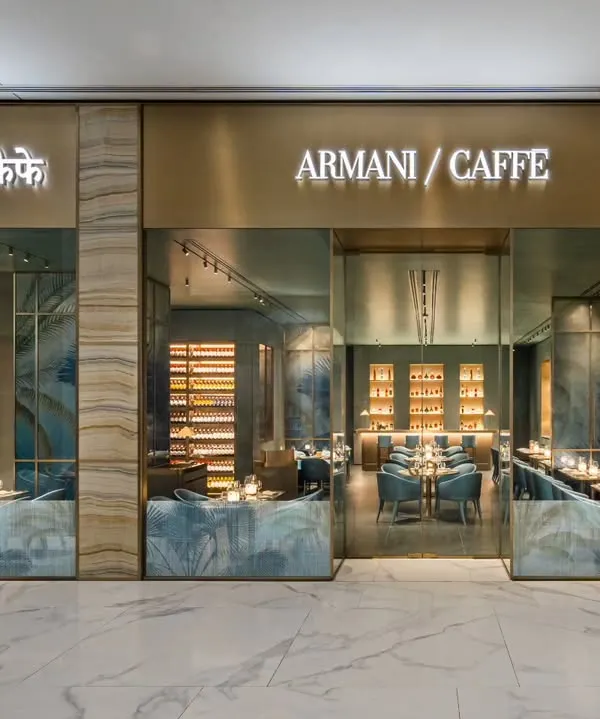 The storefront of Armani Caffe is the first impression for any guest. I shot this to highlight the seamless integration of the brand's iconic name with the elegant marble and glass facade, creating a clear and luxurious invitation into the space.