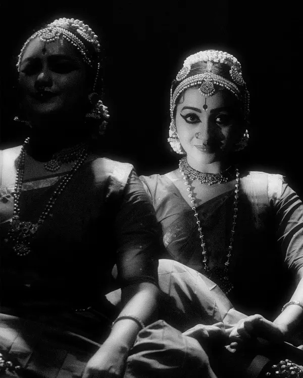 A black and white artistic shot from 'Nritya Lahari,' a group performance choreographed by my Guru. The lighting creates a dramatic, intimate mood.