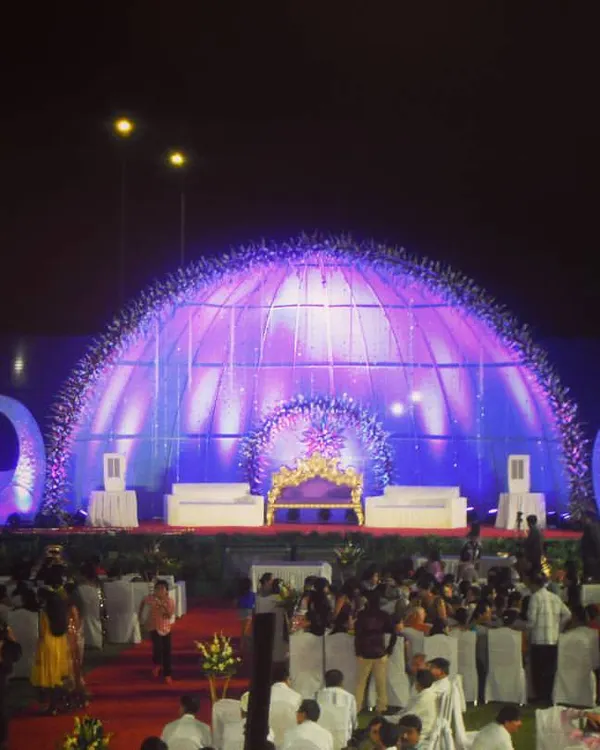 This massive illuminated dome stage is perfect for large, outdoor receptions that need a spectacular focal point. We handle all aspects of these large-scale productions, including lighting and structure.
