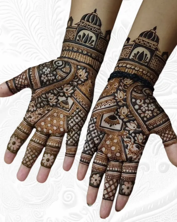A classic Teej festival design featuring palace architecture on the wrists and a mix of lotus and peacock motifs on the palms.