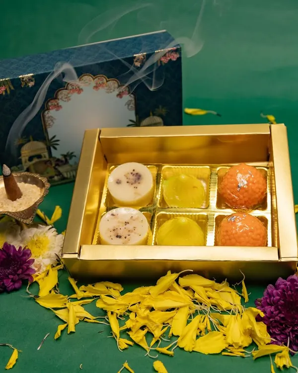 This is our signature Mithai Soap box, a perfect example of how we blend tradition with creativity. It features handmade goat milk soaps shaped like Ladoo, Kesar Modak, and Almond Peda, making it a unique and delightful gift for any festive occasion.