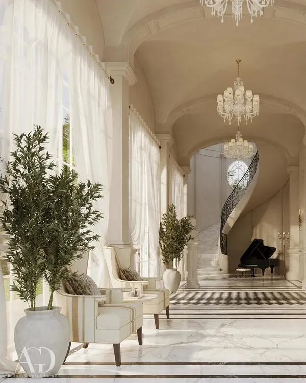 I believe a home's first impression should be one of majesty and grace. This grand foyer is defined by its beautifully proportioned barrel vault ceiling and a sweeping curved staircase that serves as a dramatic focal point, embodying the refined, harmonious, and majestic atmosphere I strive to create.