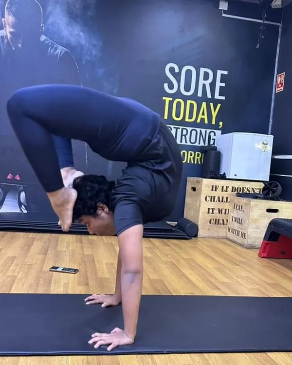 The scorpion handstand requires immense shoulder stability, core strength, and spinal flexibility. It's a pose I've worked on for a long time, and it represents the peak of integrating strength and mobility.