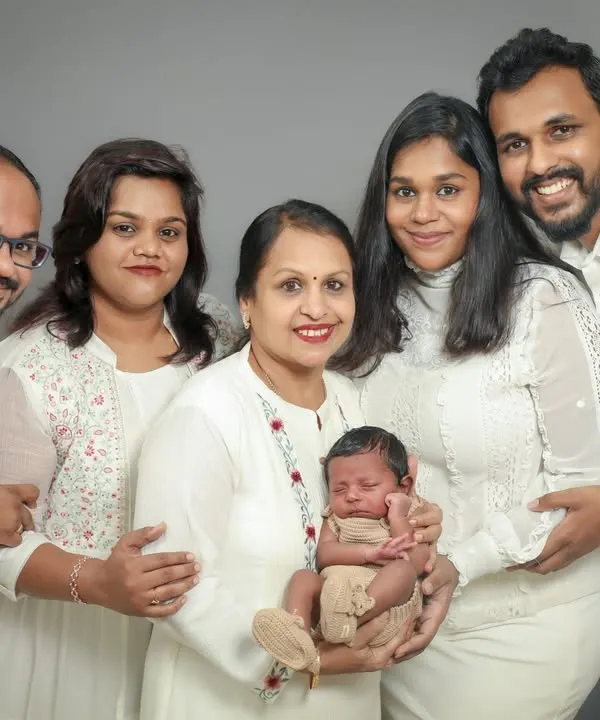 This is what it's all about. Capturing the whole family, from the newest little one to the proud grandparents, all together in one frame. These are the moments we live for, full of love and connection.