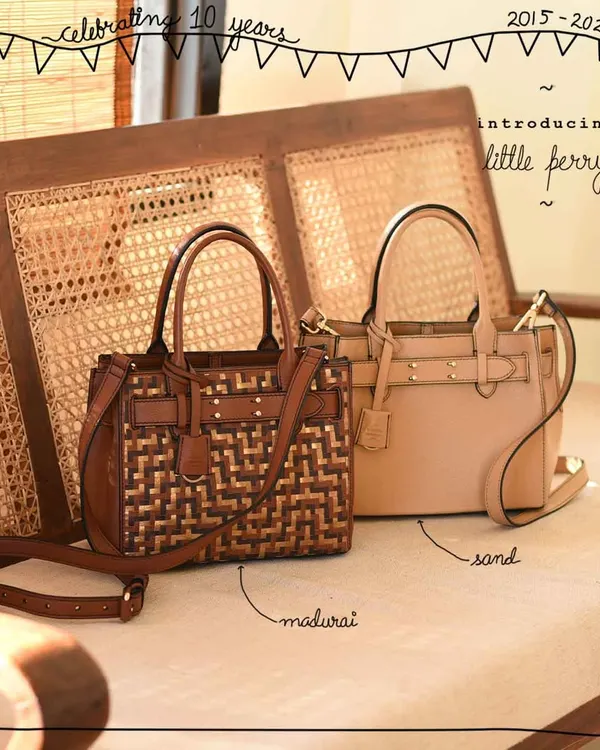 Introducing the Little Perry, a compact version of our classic belted satchel. It's shown here in two beautiful versions: the tri-color woven Madurai and a classic, versatile solid Sand leather.