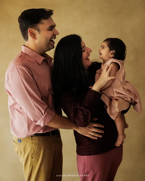 An unscripted moment of pure family joy. This candid lifestyle portrait captures the genuine laughter and love that you'll want to remember forever.