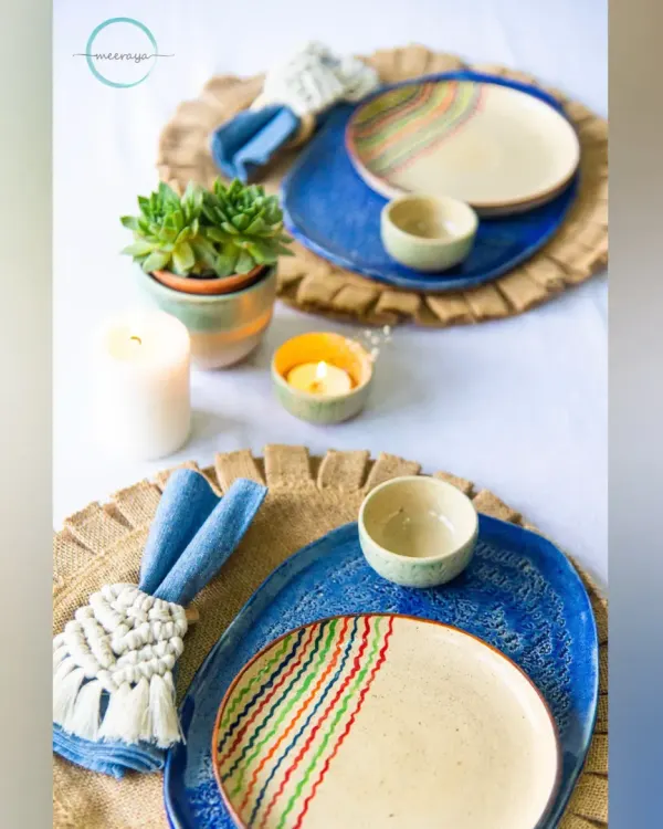 You can't buy love, but you can buy handmade, and that's pretty close. This dinnerware set, with its organic shapes and hand-painted details, is ready to make your meals feel a little more special.