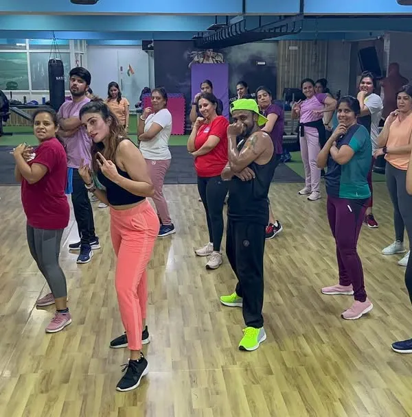 A snapshot of the pure fun in our Zumba class. Everyone is engaged, smiling, and moving to the beat in this high-energy group fitness session.