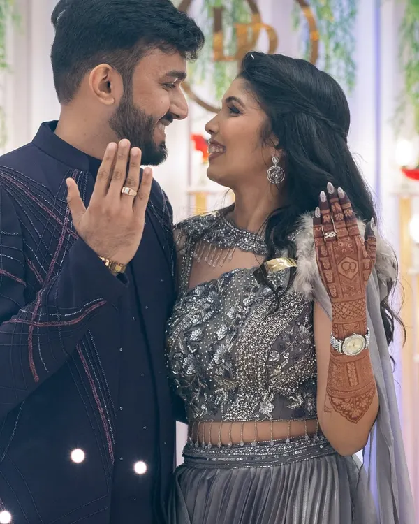 The perfect engagement shot. The bride's beautiful, dark mehendi stain is on full display as she shares a moment with her fiancé.