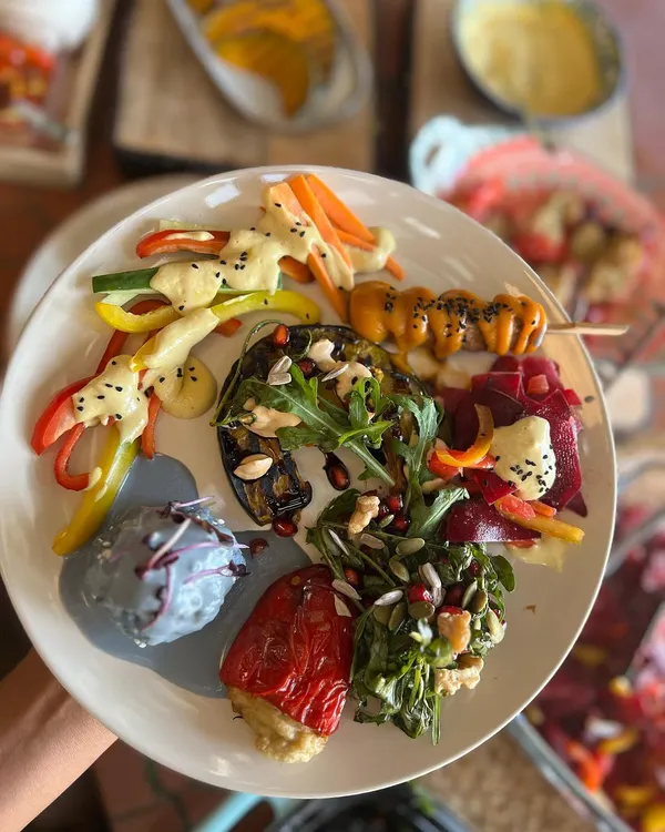 This plate represents everything I believe in: food that is vibrant, nourishing, and bursting with life. I create every meal using only whole, plant-based ingredients to fuel your body and delight your senses, proving that healthy eating is anything but boring.