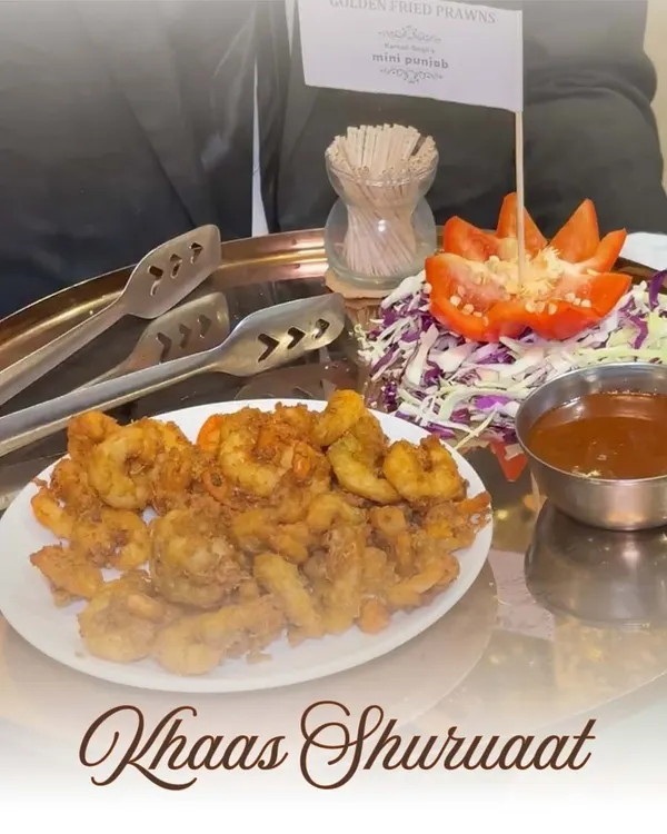 A "Khaas Shuruaat" or special beginning with our Golden Fried Prawns. Crispy, succulent, and perfectly seasoned, this appetizer is a luxurious treat that is sure to impress your guests.