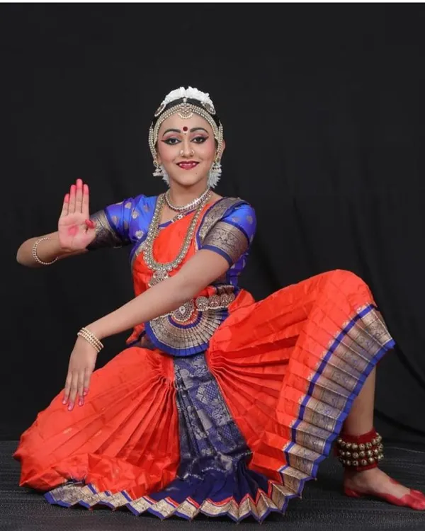 This is Aditi, who completed her Arangetram this year. This pose is from the piece 'Bho Shambho', a powerful ode to Lord Shiva, and her expression captures the devotion of the piece.