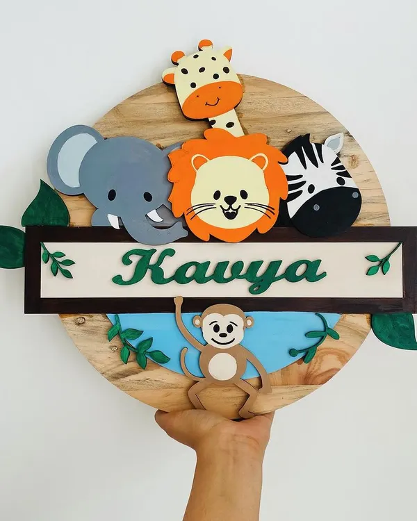 This jungle-themed wooden name board is one of my absolute favorites to make. I hand-paint each animal, from the cheerful lion to the cheeky monkey, to bring a burst of wild fun to your child's room. It’s a perfect example of how I turn a simple name sign into a piece of art.