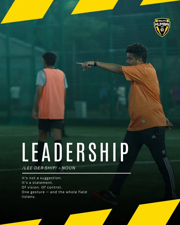 Leadership isn't loud, it's clear. A coach directing his players on the field, demonstrating the vision and control we teach. We don't just train players, we shape leaders.