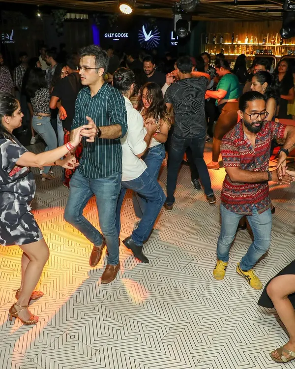 A packed floor at one of our Friday Night Open Floor events. This is where students from all our classes, from Salsa to Jive, come together to practice, socialize, and let loose after a long week.