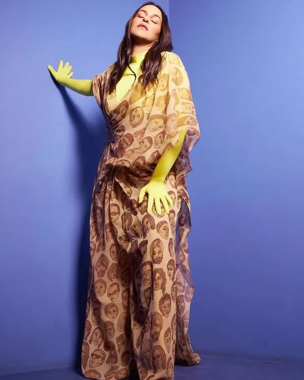 Styling Neha Dhupia is always a creative joy. For this look, we used a unique printed dress from Huemn with bold neon green glove-sleeves, creating a striking and unconventional silhouette.