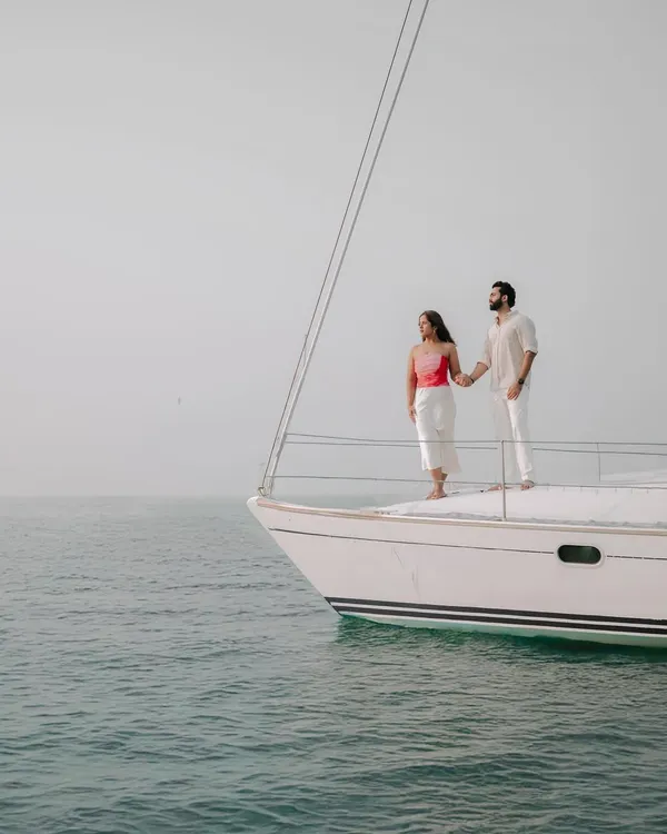 Anushka and Himanshu enjoying the open sea on a private yacht off the coast of Mumbai. A yacht shoot is a fantastic way to get unique and luxurious pre-wedding photos.