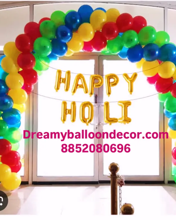 Getting into the festive spirit with a colorful 'Happy Holi' decoration. This rainbow balloon arch is perfect for entryways at home or for office celebrations.