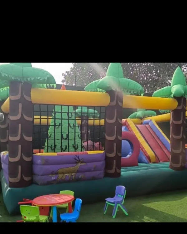 This jungle adventure bouncy castle is one of my most popular rentals. It features a slide and a large jumping area, perfect for kids who love to explore and play.