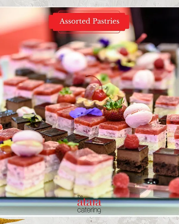 A colourful and tempting platter of assorted European pastries. Our dessert selection includes mini cheesecakes, chocolate mousse bites, and fruit tarts, perfect for any celebration.