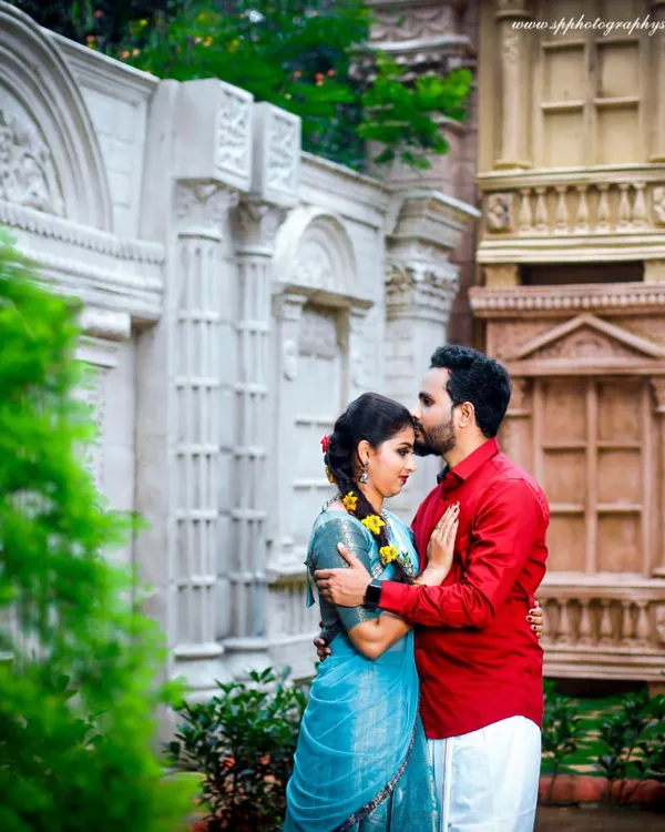 A tender moment captured during an outdoor pre-wedding shoot. We use natural surroundings and beautiful architecture to create a romantic backdrop for your portraits.