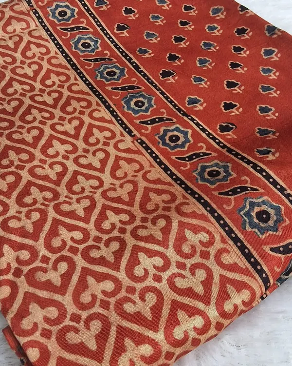A beautiful Ajrakh print on modal fabric. This versatile piece can be used as a dupatta or can be custom-stitched into a stylish kurti or top.