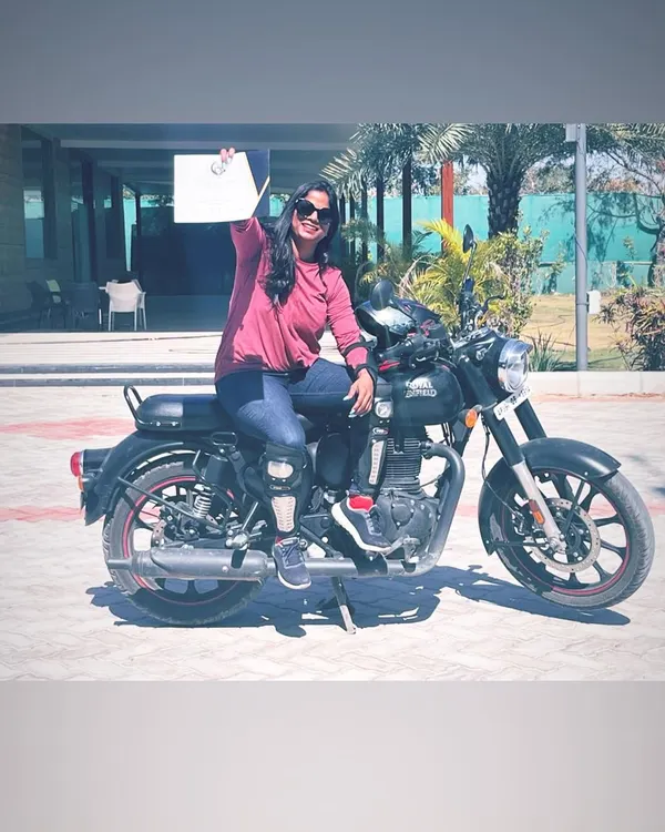 The look of a champion rider. Holding her certificate, this graduate is ready to take on any road with her newfound skills and confidence.