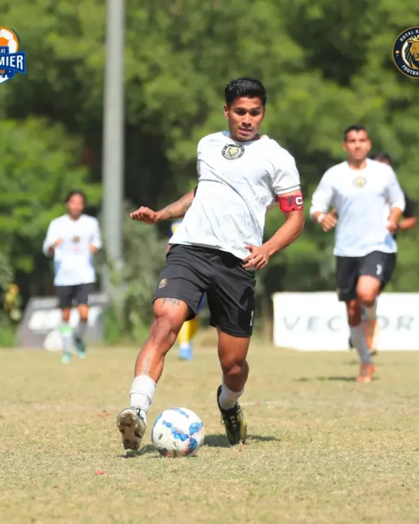 Our captain leading by example, driving forward with the ball and setting the tempo for the team. This is the determination that runs through our squad.