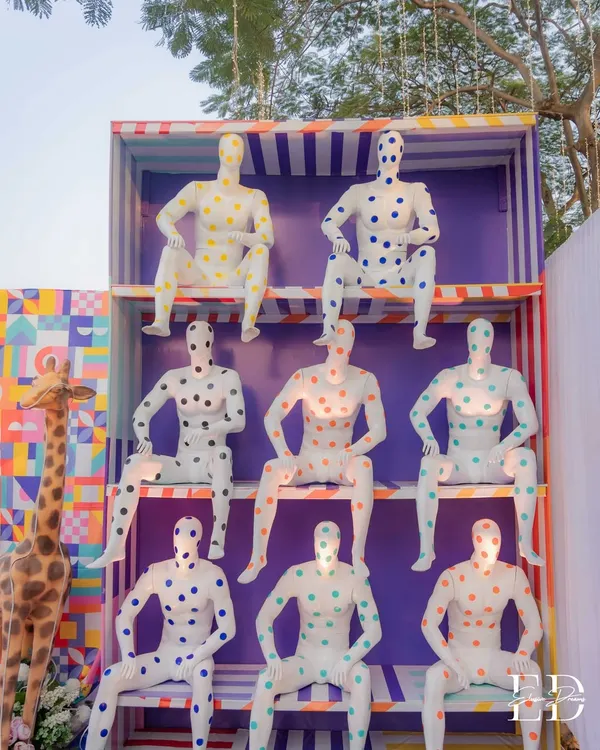 An army of polka-dotted mannequins stands guard, setting a playful and surreal tone for the carnival. This large-scale installation was designed to be a bold, Instagrammable moment right from the entrance.