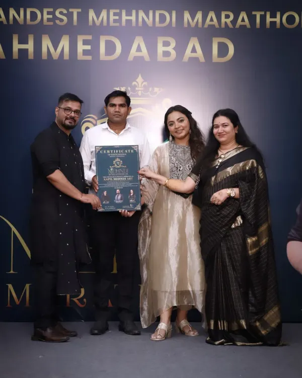 Receiving my certificate at the Grandest Mehndi Marathon in Ahmedabad. It is an honor to be recognized among so many talented artists.