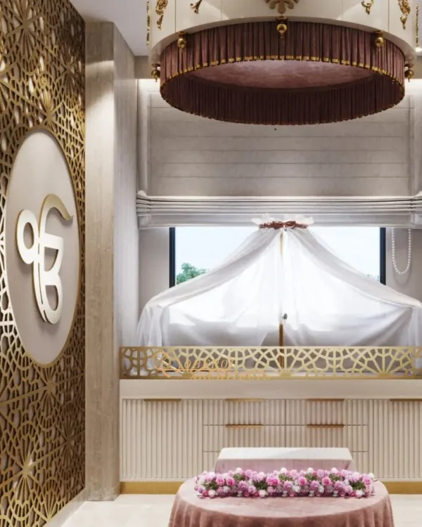 A close-up of our prayer room design, showcasing the intricate jaali panel with the 'Ek Onkar' symbol, the mauve canopy, and the floral arrangements that create a space of devotion and grace.