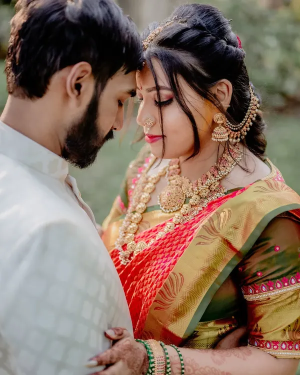 This is the kind of moment I live to capture. The quiet connection between a couple, lost in their own world, just before the celebrations begin. It’s a blend of traditional attire and pure, candid emotion.
