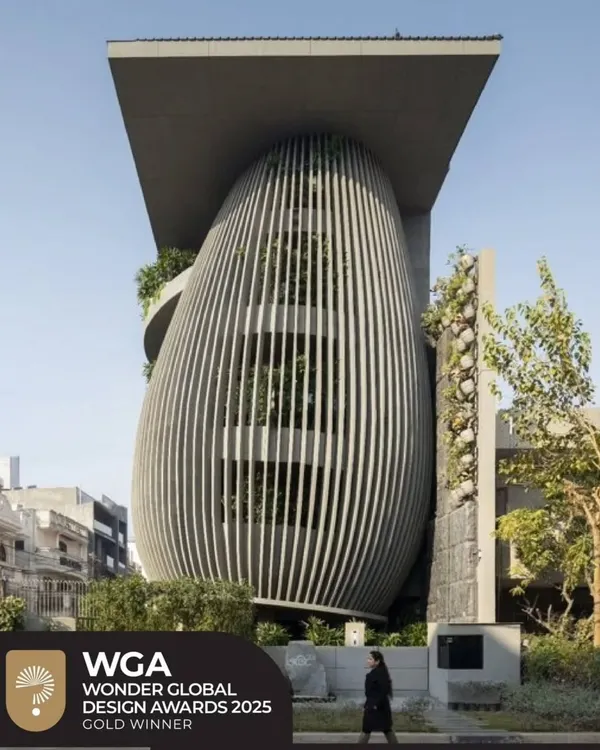 This is my own design studio in Delhi, an award-winning project that is the truest expression of my philosophy. Inspired by a tree, the building's organic form and raw concrete facade blur the line between structure and nature, creating a space that feels alive and breathes innovation.