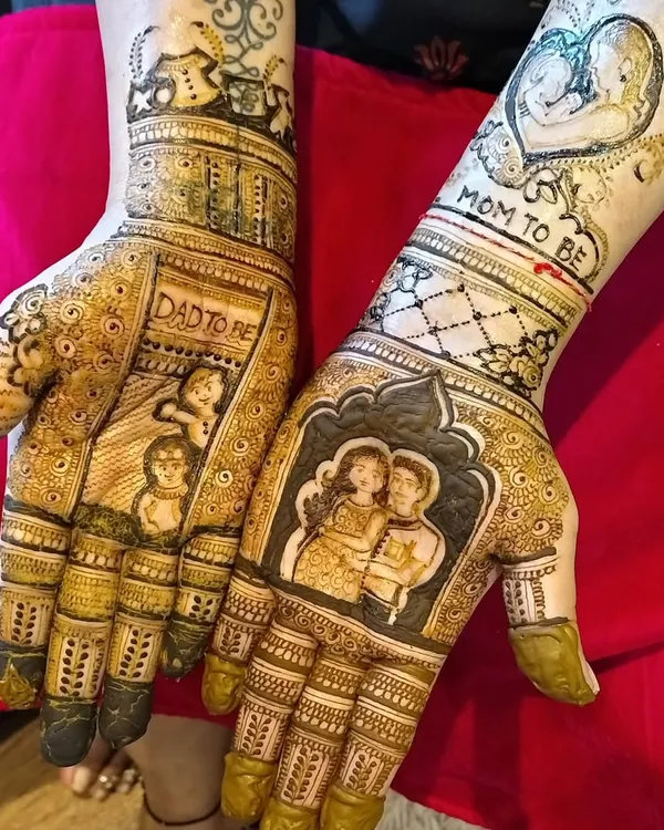 A highly personalized baby shower mehendi. I incorporated a portrait of the couple, the words 'Mom to be' and 'Dad to be', and even drawings of their other children to celebrate the growing family.