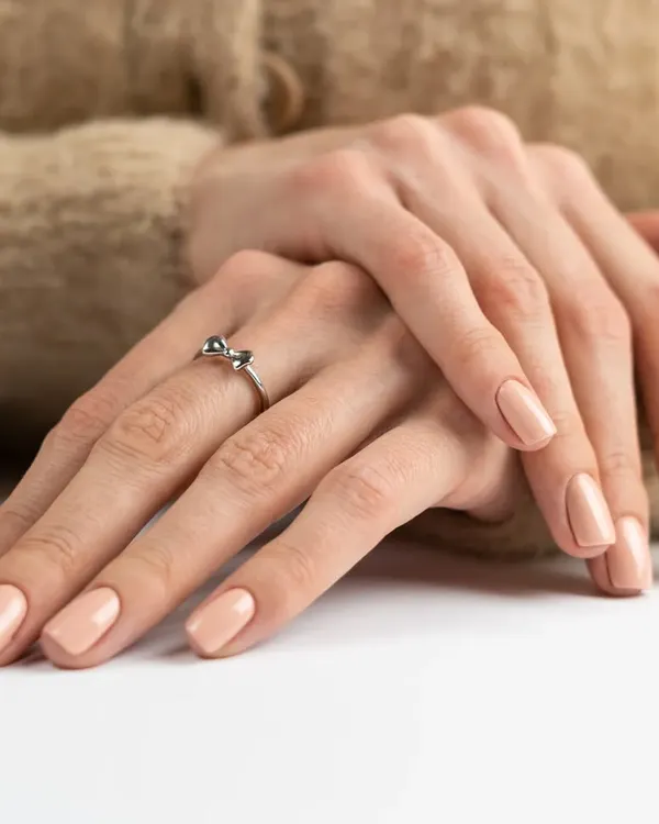 The beauty of simplicity. A classic manicure with a clean, natural polish gives your hands a timeless and elegant look.