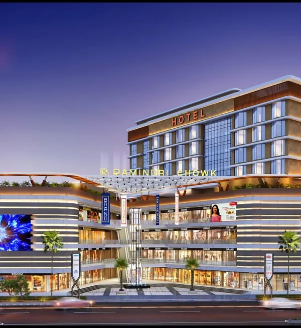 A landmark mixed-use project designed to stand out. This building combines a multi-level commercial podium with a hotel tower, featuring large digital screens and rooftop amenities to create a vibrant urban hub.