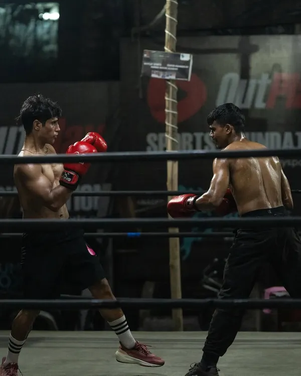 A live sparring session in our boxing ring. I train my fighters to control the distance, read their opponent, and execute techniques under pressure. This is essential for anyone looking to compete or just learn real combat skills.