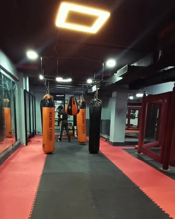 A view of our striking area, lined with high-quality heavy bags. This is where our fighters build power and perfect their boxing and kickboxing combinations.