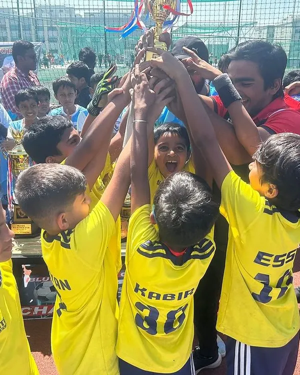 The moment of victory! Our Under-8 team lifts the Blues Super Cup trophy. This is a testament to their hard work, discipline, and the guidance of our coaches.